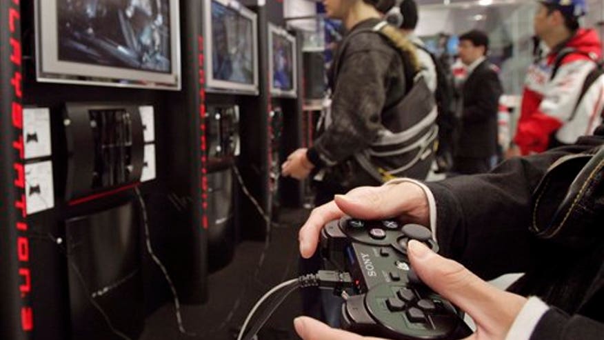 People playing Sony PlayStation